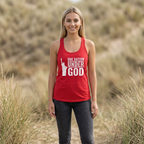 Woman wearing a red tank top with 'One Nation Under God' text and graphic, standing in a natural setting.
