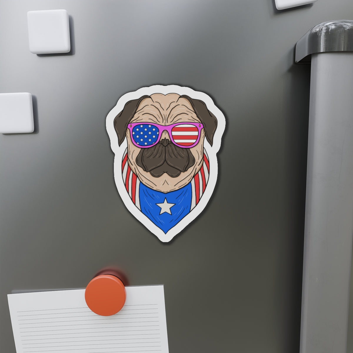 Fridge magnet of a pug wearing American flag sunglasses on a refrigerator.