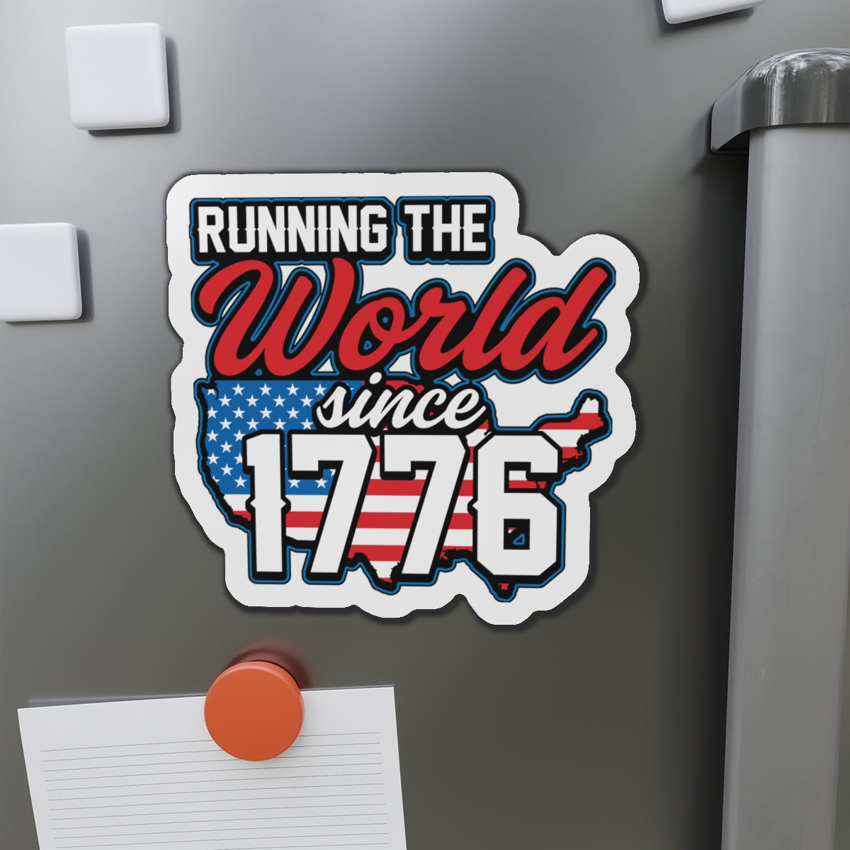 Fridge magnet with 'Running the World since 1776' text and American flag design on a metallic surface.
