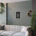 Living room with a gray wall, white sofa, and decorative items.