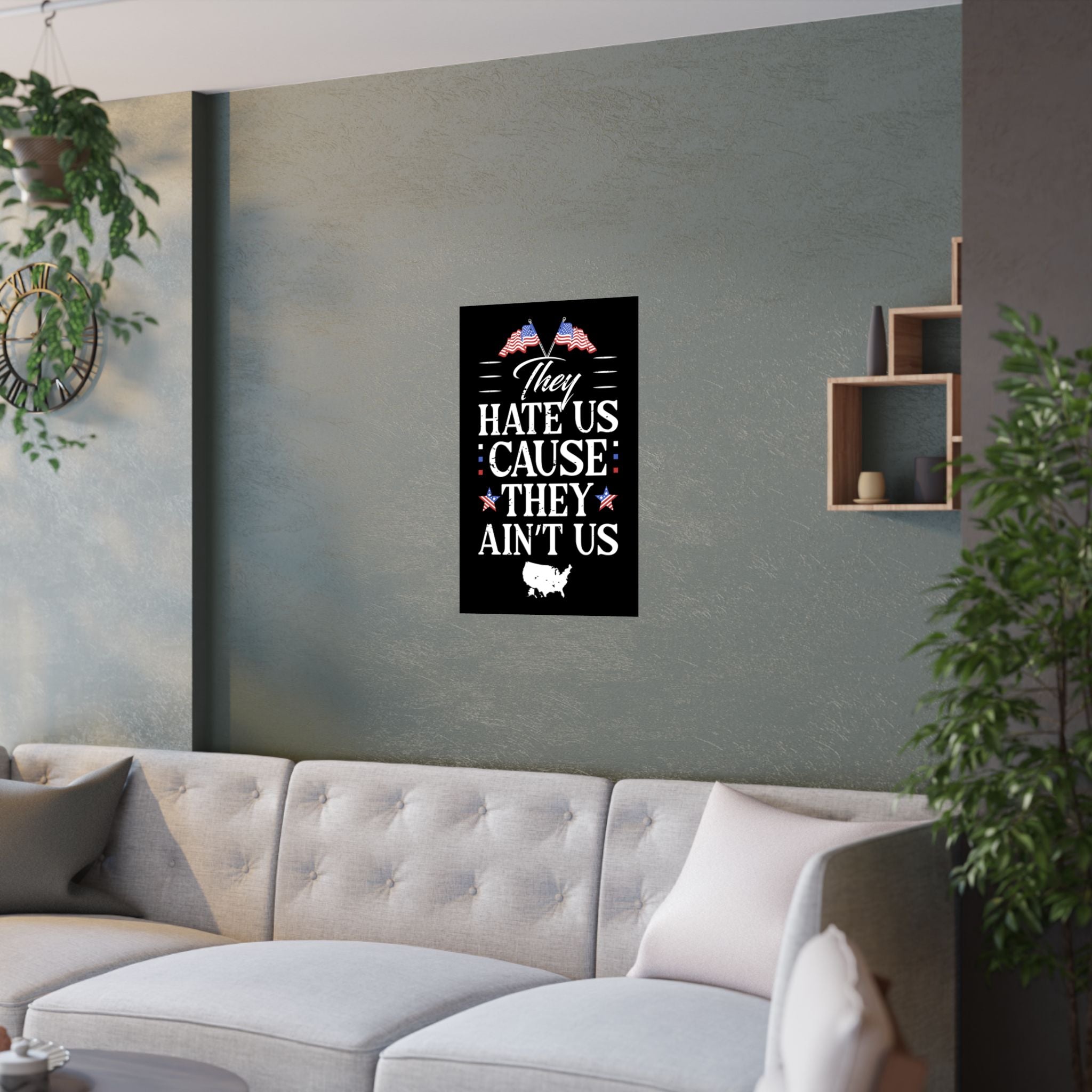 Wall art with text and flags on a gray wall above a sofa.