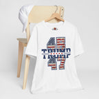 White t-shirt with graphic design on a wooden chair against a white background