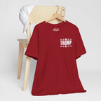 Canvas Red t-shirt with '45 Trump 47' text on a wooden chair against a white background