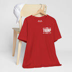 Red t-shirt with '45 Trump 47' text on a wooden chair against a white background