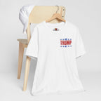 White t-shirt with '45 TRUMP 47' design on a wooden chair against a white background