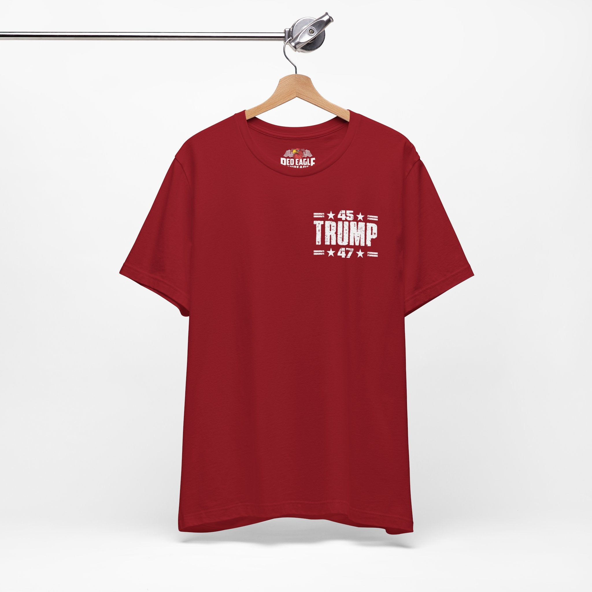 Canvas Red t-shirt with '45 Trump 47' text on a hanger against a white background