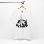 White t-shirt with graphic design of a person holding a rifle, displayed on a hanger against a white background.