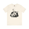Natural t-shirt with a graphic of a person holding a rifle on a white background
