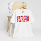White t-shirt with text and American flag design on a chair against a white background