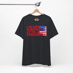 Vintage Black t-shirt with 'Cigars Whiskey Guns & Freedom' text and American flag design on a hanger.
