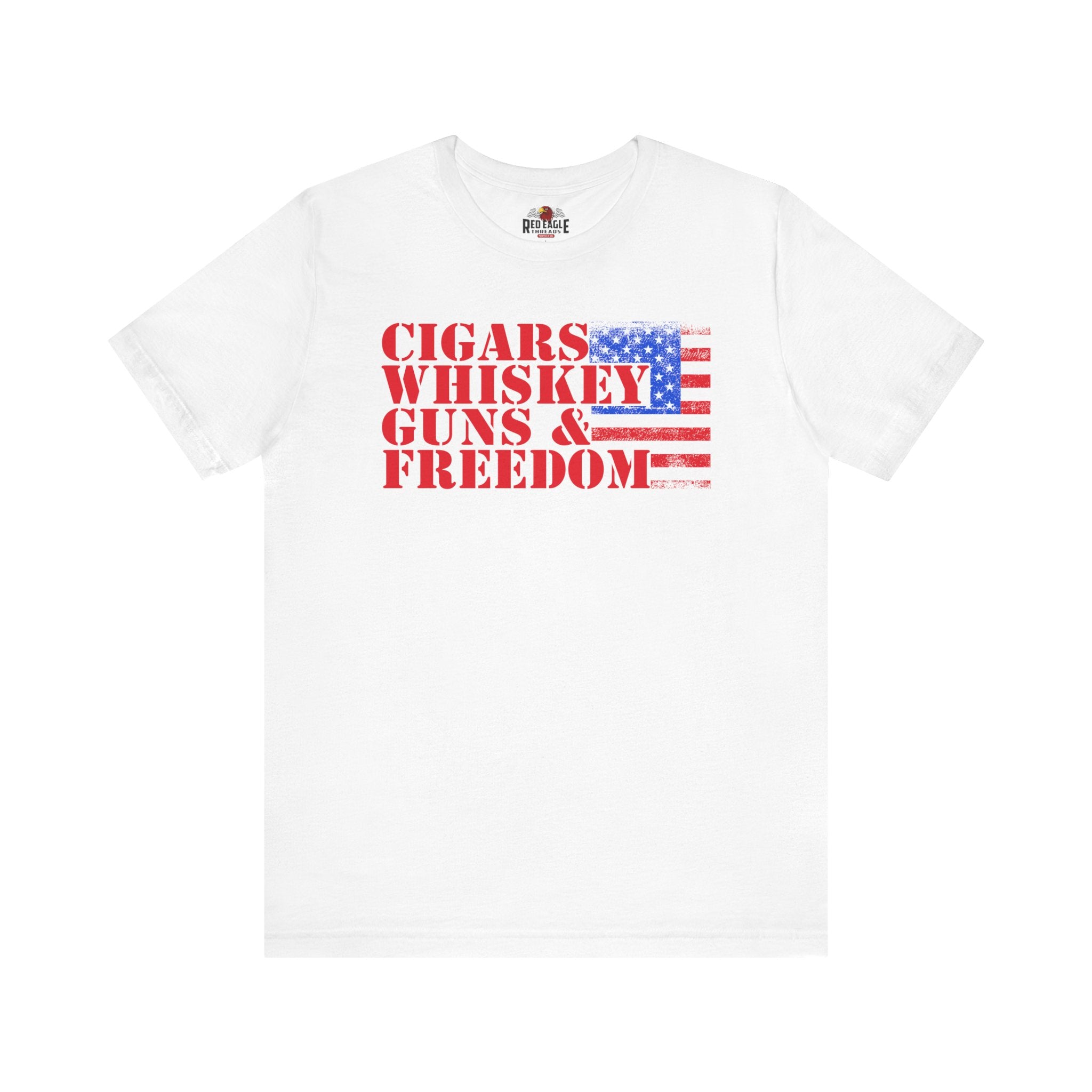 White t-shirt with 'Cigars Whiskey Guns & Freedom' text and American flag design on a white background