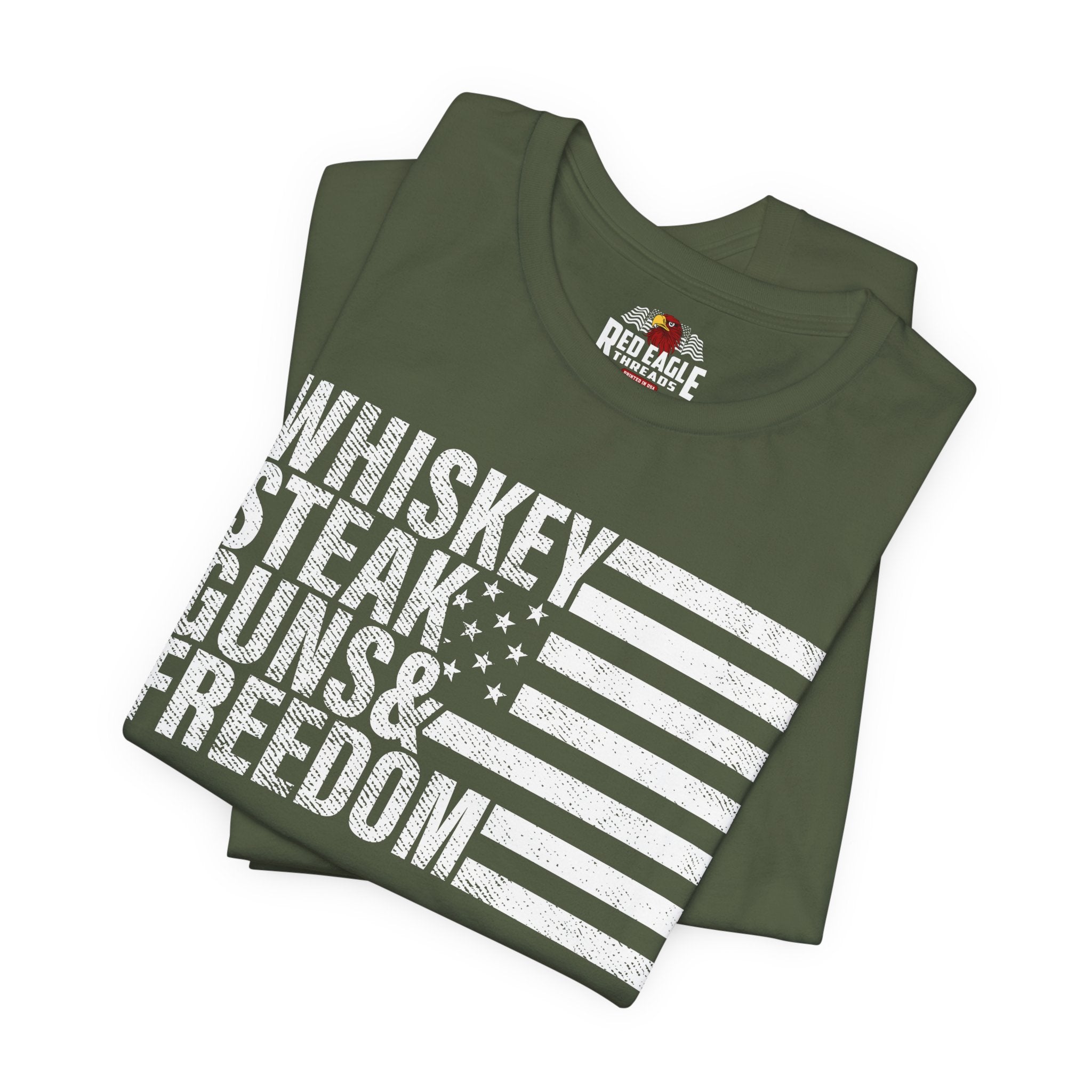 Military Green t-shirt with 'Whiskey, Steak, Guns & Freedom' text and Red Eagle logo on a white background