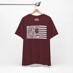 Maroon t-shirt with text and flag design on a hanger against a white background