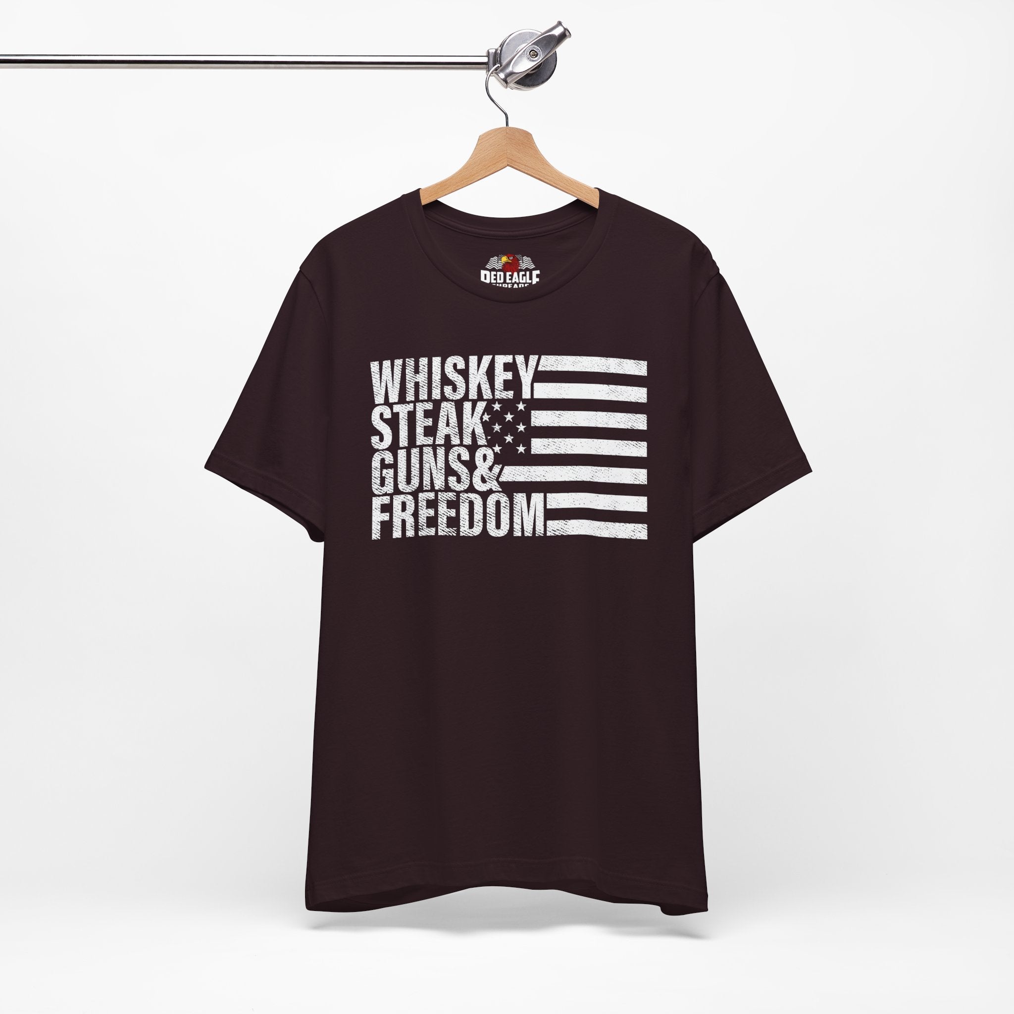 Oxblood Black t-shirt with white text and flag design on a hanger against a white background