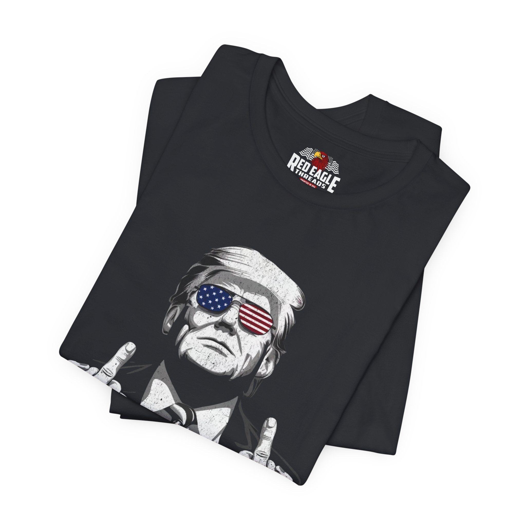 Vintage Black t-shirt with graphic design of a person wearing sunglasses with American flag design, brand 'Red Eagle' visible.