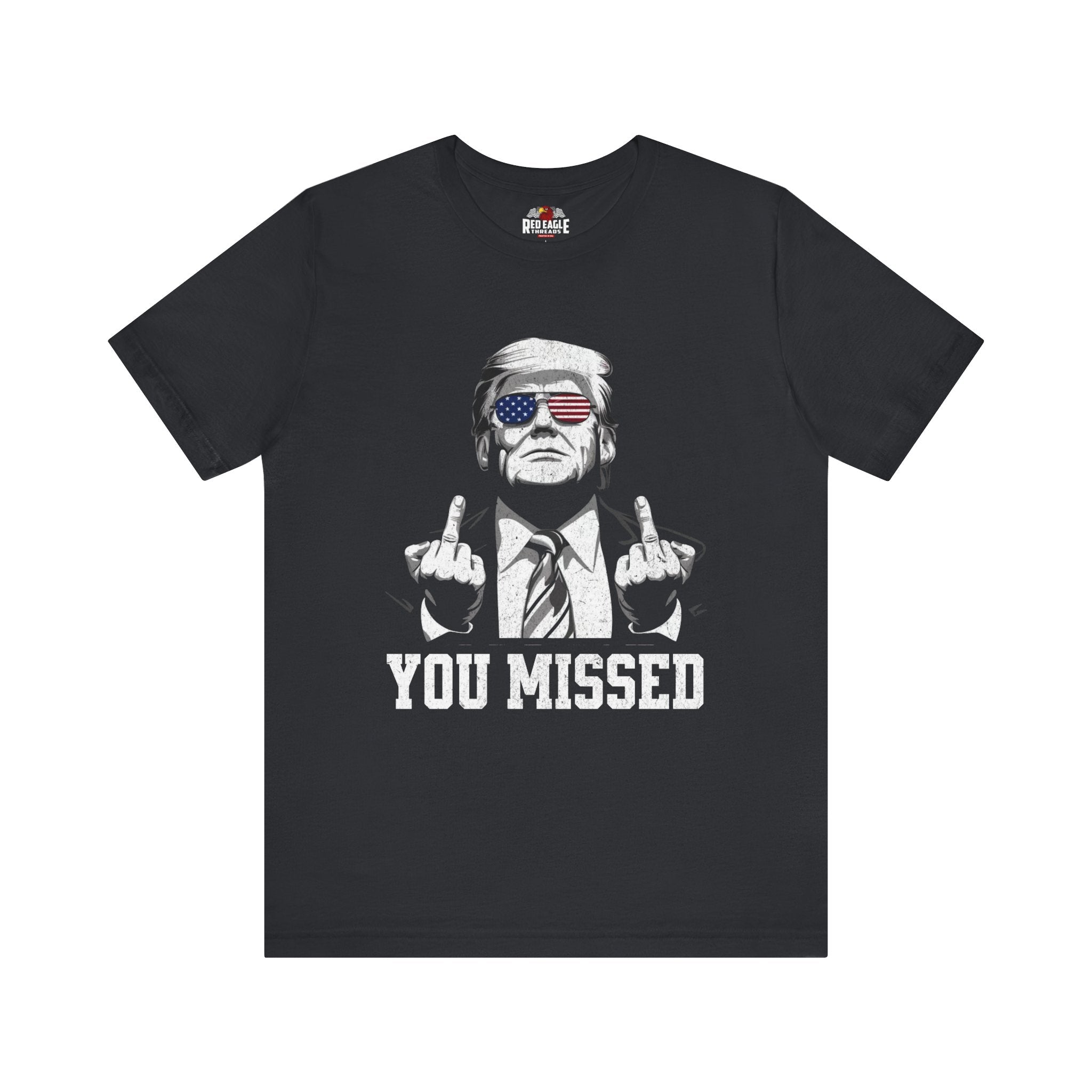 Vintage Black t-shirt with graphic of a person making a gesture and text 'YOU MISSED' on a white background